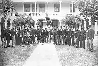 Jurisprudence and Law alumni of 1896 at a courtyard