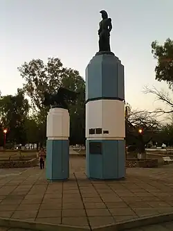 San Martín memorial at the middle of the namesake garden square in downtown at evening twilight.