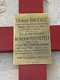 The plaque on the cross for Quentin Roosevelt in Sancy-les-Chemninots.