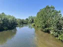 Tundzha River as seen from Saraçhane Bridge, built by Hadım Şehabeddin Pasha in Edirne, Turkey.