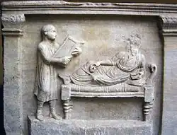 Image 64Slave holding writing tablets for his master (relief from a 4th-century sarcophagus) (from Roman Empire)