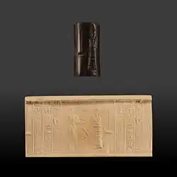 Scene of devotion with inscription