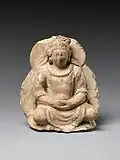 Seated Buddha with halo and mandorla 5th-6th century Gandhara.