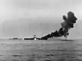 The second kamikaze strike amidships at the island, 30 seconds after the first strike aft, on 11 May 1945