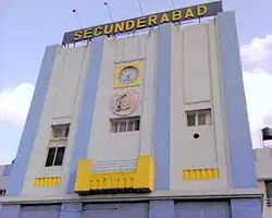 Exterior of large blue-and-white building