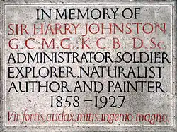 A stone memorial tablet with deeply engraved lettering