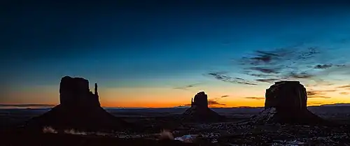 Snow-covered Monument Valley sunrise in January
