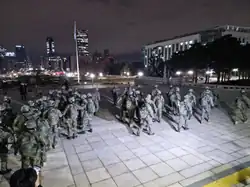 Troops of the 1st Airborne Special Forces Brigade preparing to leave the National Assembly