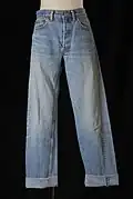 Image 86Blue wide-leg jeans. (from 1990s in fashion)