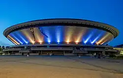 Spodek displaying the colors of the Ukrainian flag in 2024