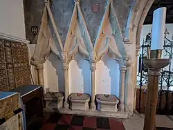 Sedilia in the south wall of the chancel at St. Mary the Virgin church at Henley On Thames, Oxfordshire, England. January 2025.