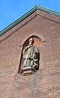 Bronze Statue of Saint Francis Xavier installed on the niche of the front gable.