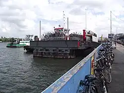 Bicycle parking on a moored ferry at Amsterdam CS. This is the old ferry 5 that used to sail over the North Sea Canal.