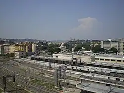 The station from a neighbouring building, with the Piramide station in the background