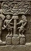 9th century C.E. Stick zither and flute played by kinnaras, from the relief of the hidden base of Borobudur - 1890-1891. The kinnara is pressing the gourd resonator into his chest. The end of the stick zither resembles a bird.