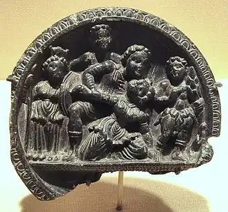 Mythological scene with Athena (left) and Heracles (right), on a stone palette of the Greco-Buddhist art of Gandhara, India