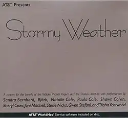 A white paper insert displaying the album's title and artists in similar fonts.