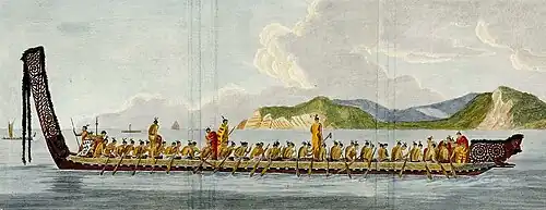 Māori warriors in a war canoe
