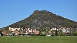 The village of Třebušín under Kalich Hill