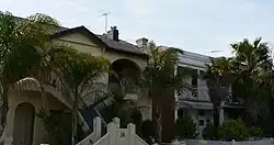Combinations of Victorian terraces and late Edwardian duplexes, and a variety of subtropical palms