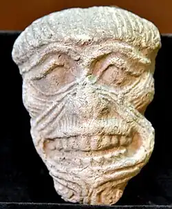 Terracotta Humbaba mask from Ur, Iraq. 2004–1595&nbsp;BCE. Sulaymaniyah Museum, Iraq