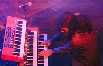 Fox performing with The Cult in 2018