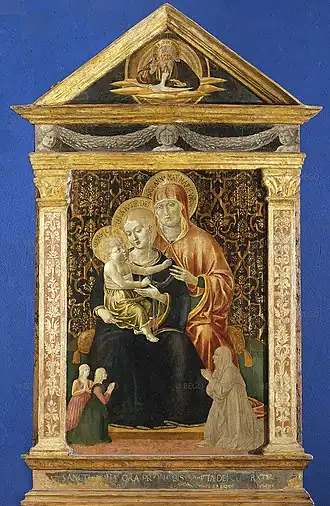 Painting with wooden frame depicting a group of two women and a baby, one above the other on a diagonal.