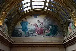 The Sacred Flame mural under a skylight