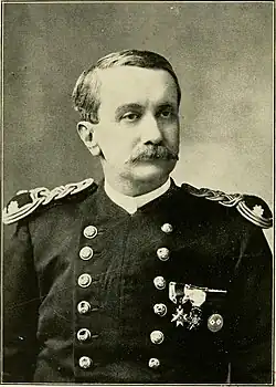 Circa 1895 head and shoulders sepia-toned head and shoulders photo of Samuel T. Cushing in lieutenant colonel's dress uniform