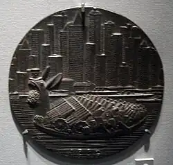 An unsympathetic later medal, also by Gies. Shows ship as a monster packed with weapons, mouth full of coins.