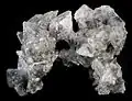 Thénardite, cluster of transparent crystals from Soda Lake, California. Width of cluser is 9&nbsp;cm (3.5&nbsp;in).