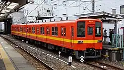 Orange-liveried 8000 series set 8577 in April 2016