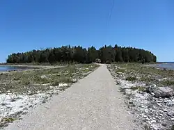 View of the tombolo and island on May 24, 2013; during May 2013 Lake Michigan had an average water level of 175.93 meters above sea level