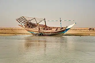 Traditional dhow on Al Mafjar beach