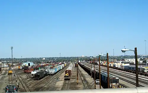A typical U.S. classification yard in Denver, Colorado. Intermodal terminal is on the right