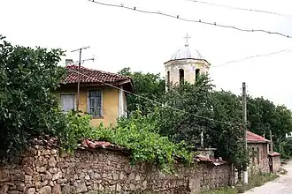 An old house and the church belfry