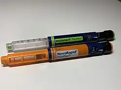two medicine pens