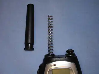 Rubber ducky antenna on 446 MHz UHF walkie-talkie with rubber cover removed.