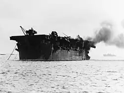 The light aircraft carrier USS&nbsp;Independence&nbsp;(CVL-22) afire aft, soon after the "Able Day" atomic bomb air burst test at Bikini on July 1, 1946