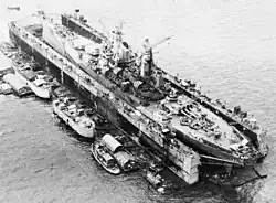 USS&nbsp;Iowa&nbsp;(BB-61) floating in dry dock at Manus Island, Admiralty Islands, 28 December 1944