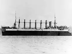 Side view of USS Jason (AV-2) in dry dock Dewey, 9 March 1932