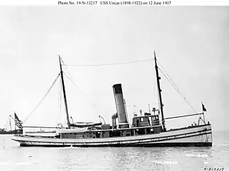 USS Uncas (AT-51) anchored in Hampton Roads, VA., 12 June 1907.