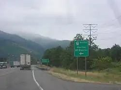 U.S. Route 12 eastbound approaching SR 7's southern terminus, which includes a sign with the control cities of Morton and Mount Rainier.