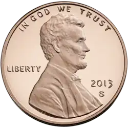 A 2013 one-cent coin from the United States (valued at 1/100 of a dollar), known colloquially as a penny.