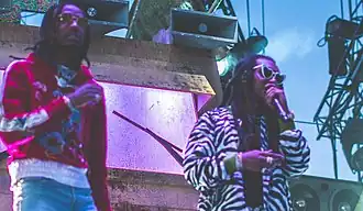 Quavo (left) pictured performing alongside Takeoff (right) as part of Migos, in 2017