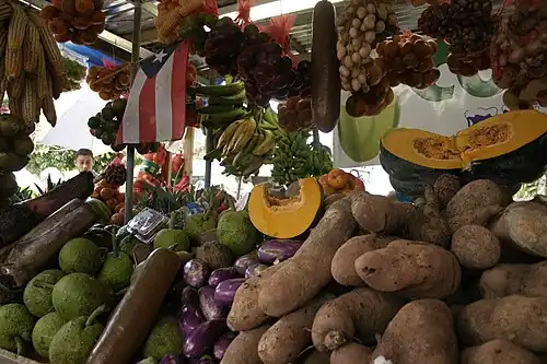 Vegetable display at festival Fiesta Acabe del Café in Maricao