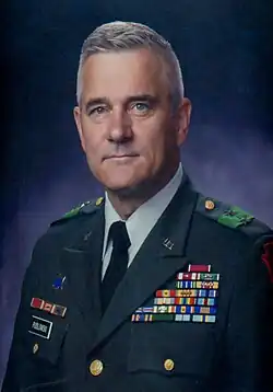 1999 color head and shoulders portrait of Major General Walter F. Pudlowski in dress green uniform