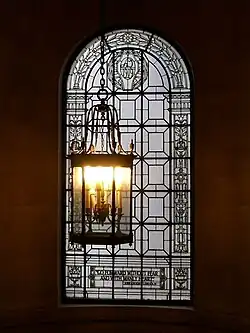 The stained glass window in the staircase