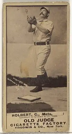Standing man in baseball uniform