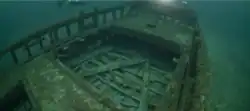 Overhead underwater view of the forward area of a shipwreck